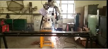 Indexing type Robotic MIG welding work station for child part - pallets