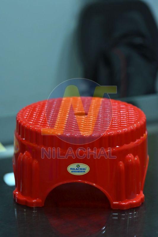 Red Plastic Bathroom Stool
