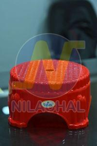 Red Plastic Bathroom Stool