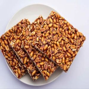 Peanut Chikki, Color : Brown, Packaging Type : Plastic Packet