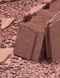 Polished Dotted Sandstone Chips, Color : Light Red, Form : Slab
