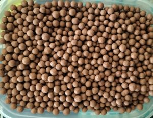 Brown Bentonite Granules, Brand Name : GK Organics, Purity : 90%