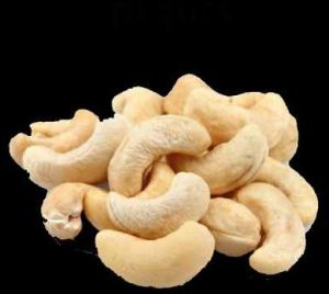 Raw Cashew Nut, Color : Beige, Packaging Type : Vacuum-sealed Bag
